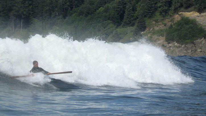surfing a kayak at oswald west state park