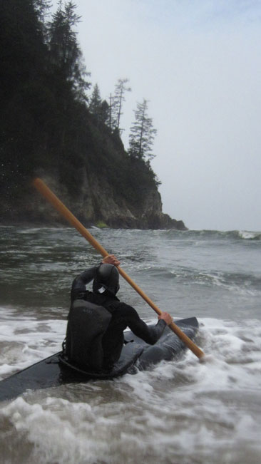 paddling into the surf with a greenland blade