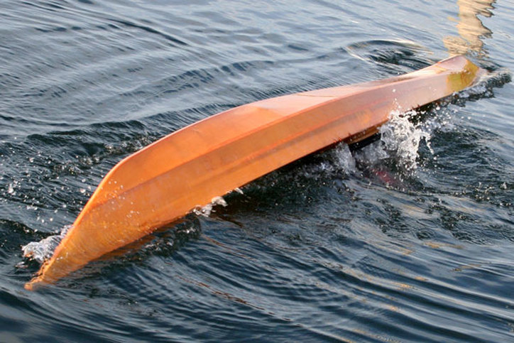 Greenland rolling a kayak